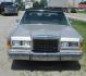 1989 Silver Frost /Titanium Lincoln Town Car (1LNBM81F5KY) with an V8 engine, Automatic transmission, located at 1725 US-68 N, Bellefontaine, OH, 43311, (937) 592-5466, 40.387783, -83.752388 - 1989 LINCOLN LUXURY TOWN CAR 5.0L V8, AUTO, Midnight Black Carriage Roof, Silver Frost -Titanium leather 6-way twin comfort recliner driver & passenger seats, AM/FM/CASS, Power Antenna, PW, PL, Power Deck Release, Tilt Steering Fingertip Speed Control, Wire Wheel Covers. - Photo#4